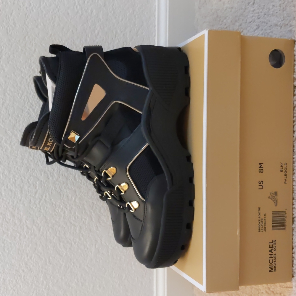 NIB Michael Kors Brooke bootie black leather with gold detailing. Size 8